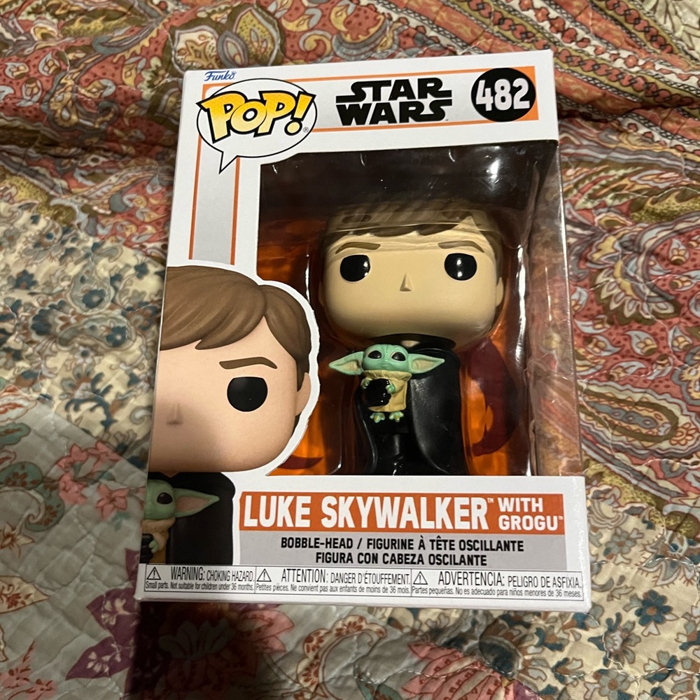 Luke Skywalker with guru funko pop